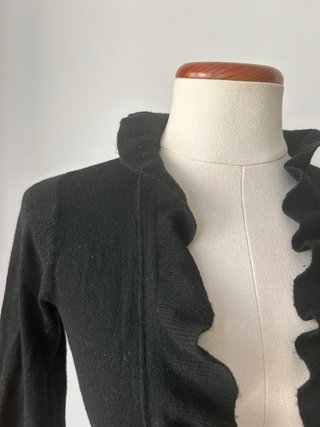 Bolero negro con volantes