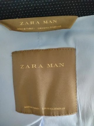 Traje azul: chaqueta, camisa y pantalón