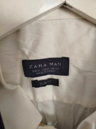 Traje azul: chaqueta, camisa y pantalón