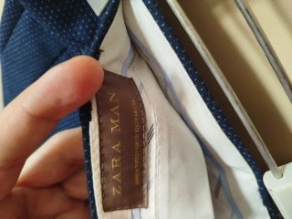 Traje azul: chaqueta, camisa y pantalón