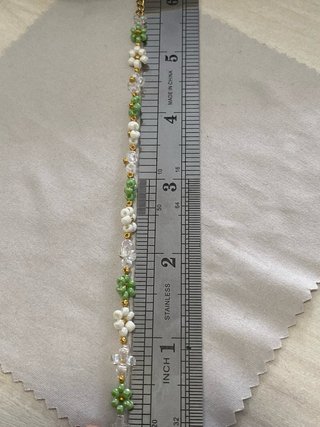 Pulsera de flores blanca, verde