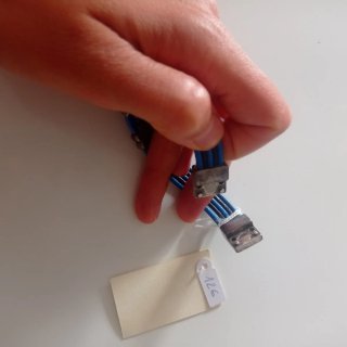 Pulsera artesanal flores azul y gris