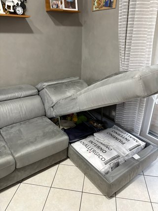 Divano letto angolare grigio tessuto