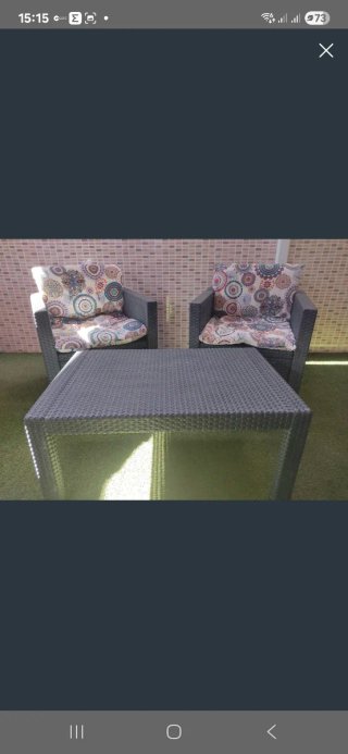 Muebles de exterior ratán gris y cojines