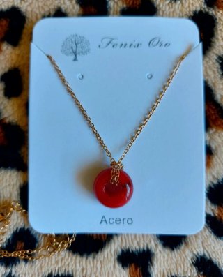 Colgante Fenix Oro Acero y Piedra Roja