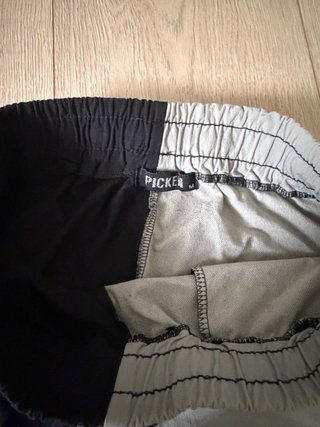 Pantalones elásticos hombre negro/verde oliva