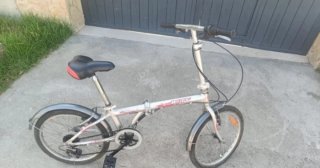 Bicicleta plegable plateada
