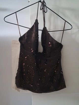 Top marrón con brillos talla L del Stradivarius