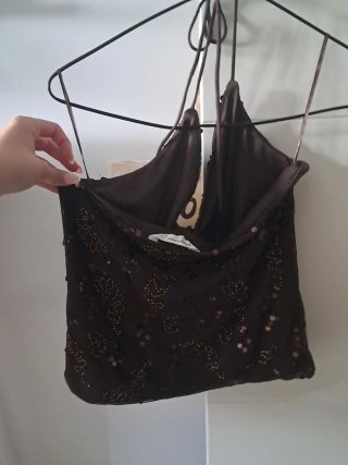 Top marrón con brillos talla L del Stradivarius