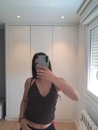 Top marrón con brillos talla L del Stradivarius