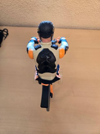 Muñeco Action Man con Bicicleta