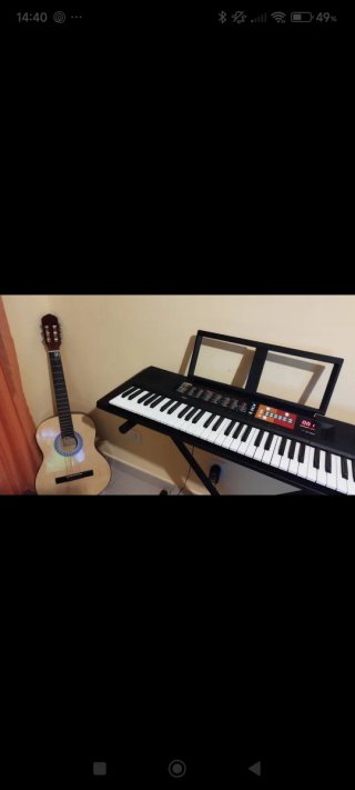 Teclado Yamaha casi sin uso con soporte