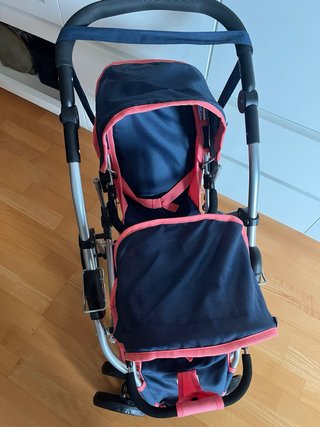 Carrito gemelar de juguete