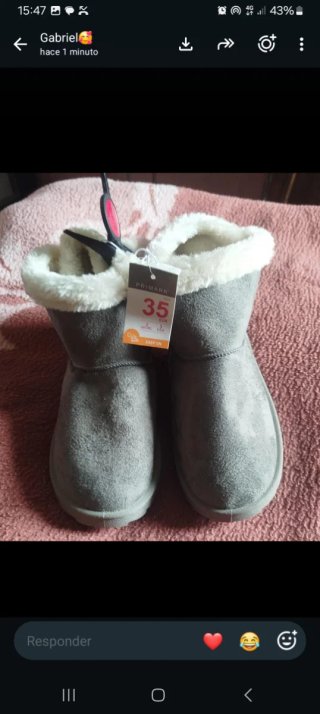 Botas de mujer grises y blancas con lazo