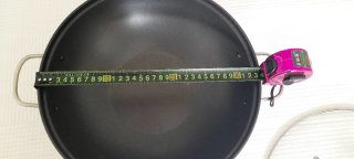 Wok de metal con tapa de cristal