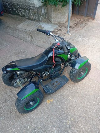 Quad infantil negro y verde