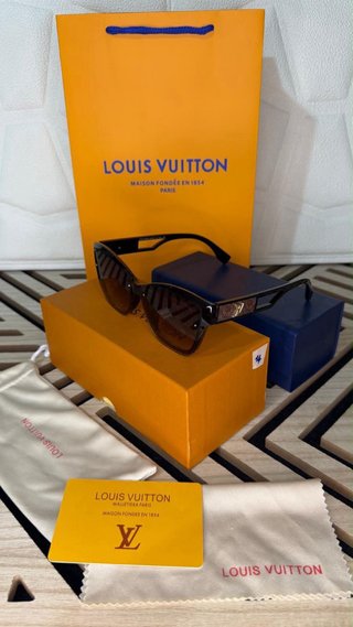Occhiali da sole Louis Vuitton neri e oro
