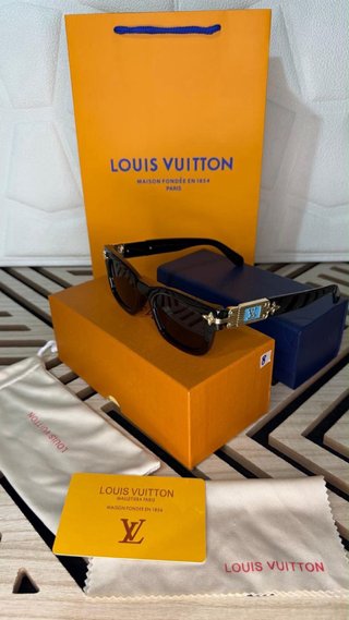 Occhiali da sole Louis Vuitton neri e oro