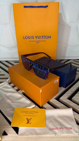 Occhiali da sole Louis Vuitton neri e oro