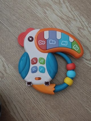 Juguete musical pájaro con teclas