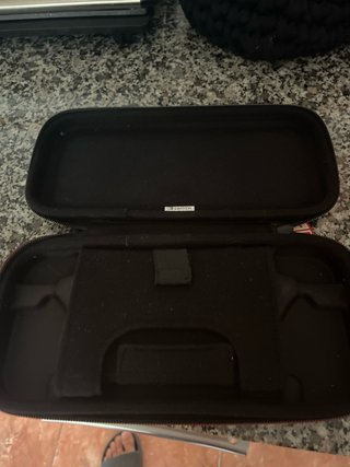 Nintendo Switch + funda i cargadores +mandos