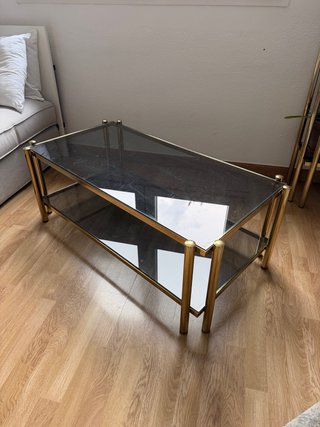 Mesa centro metal dorado cristal ahumado