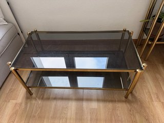 Mesa centro metal dorado cristal ahumado