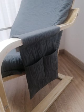 Sillón balancín de tela y madera