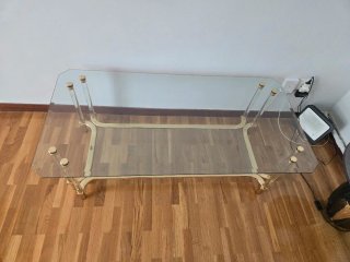 Mesa de centro cristal y metal dorado