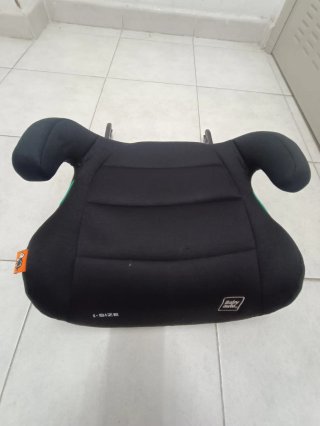 Alzador infantil y protector asiento coche