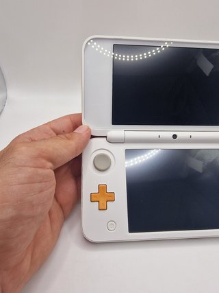Nintendo 2DS XL Arancione e Bianco