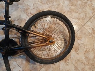 Bicicleta BMX Negra y Dorada