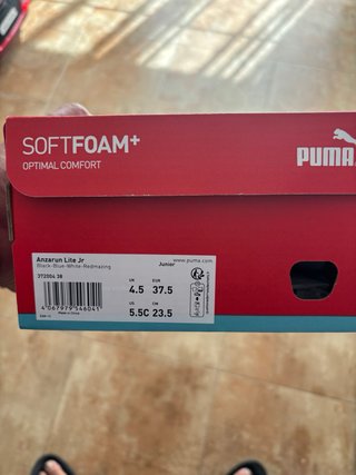 Tenis Puma niño negro y azul nuevo a estrenar.