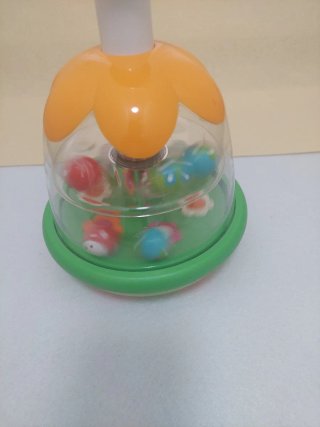 Trottola Chicco colorata con palline