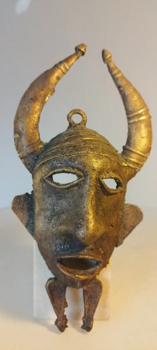 Máscara tribal africana retro de metal (bronce o