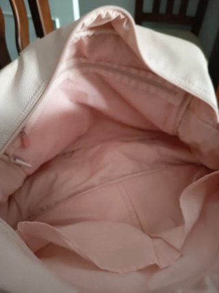 Bolso o macuto de bebé rosa