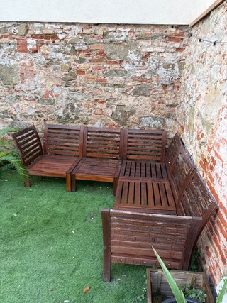 Sofá esquinero de madera para exterior