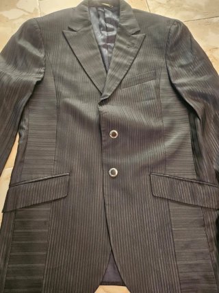 Abito uomo nero a righe