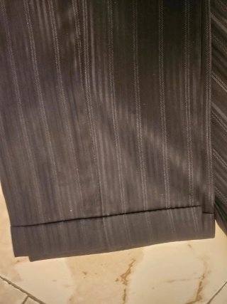 Abito uomo nero a righe