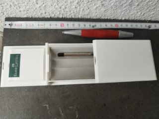 Bolígrafo Faber-Castell madera de raíz y plateado