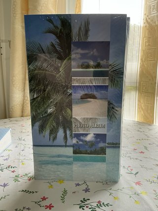 Álbum de fotos de playa precintados