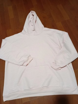Sudadera rosa acolchada con capucha