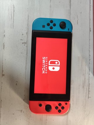 Nintendo Switch + caja y accesorios originales