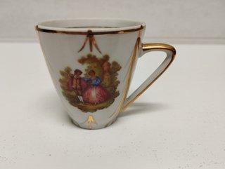 Juego de café porcelana detalles dorados