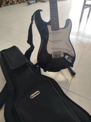 Guitarra+ funda+tripode
