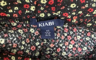 Pantalón Kiabi floral campana T.XS