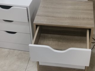Mesita de noche blanca y cambria