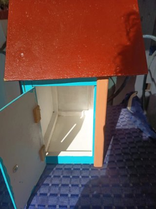 Casita para pájaros decorativa