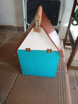 Casita para pájaros decorativa