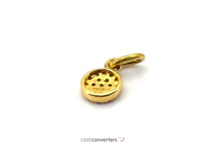 colgante oro 18k con piedra con diamante